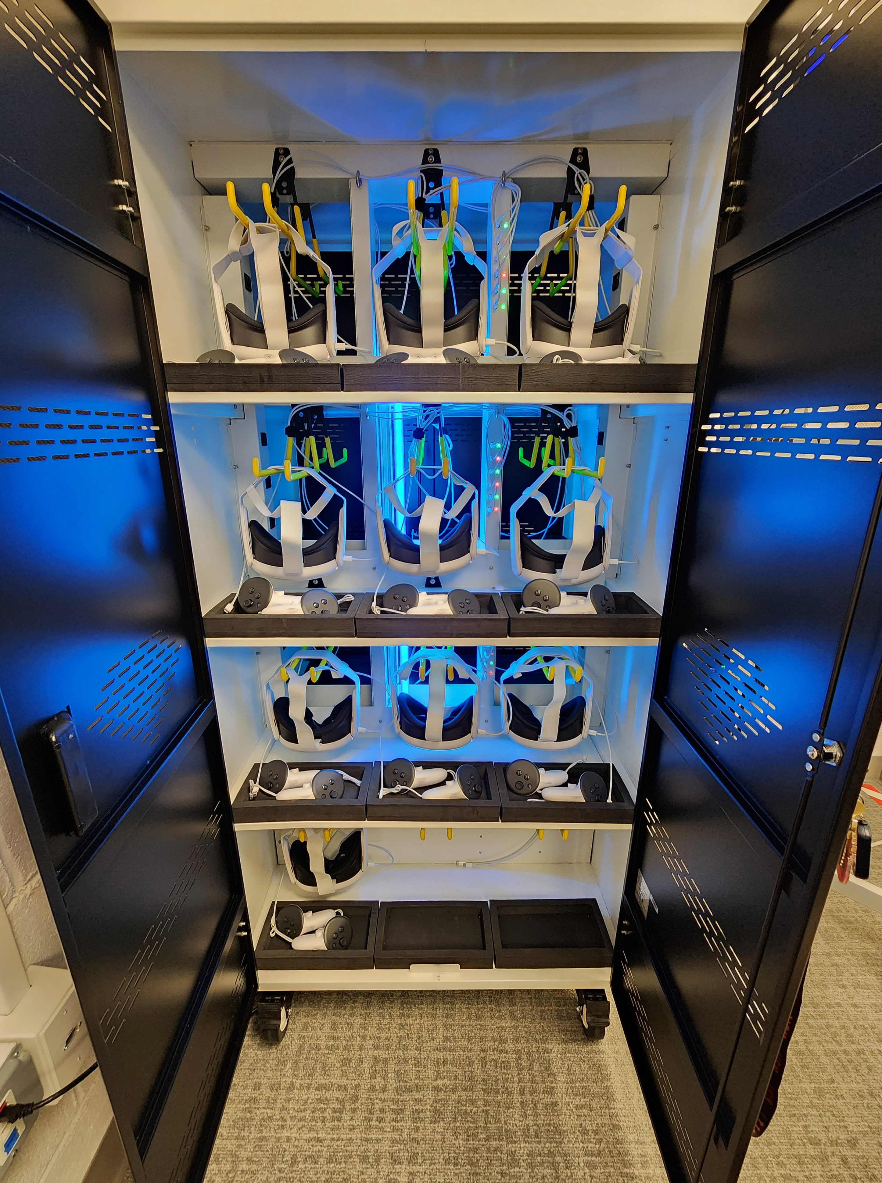 XR headset charging and sanitizing storage cabinet