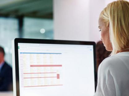 Photo of a woman using a computer