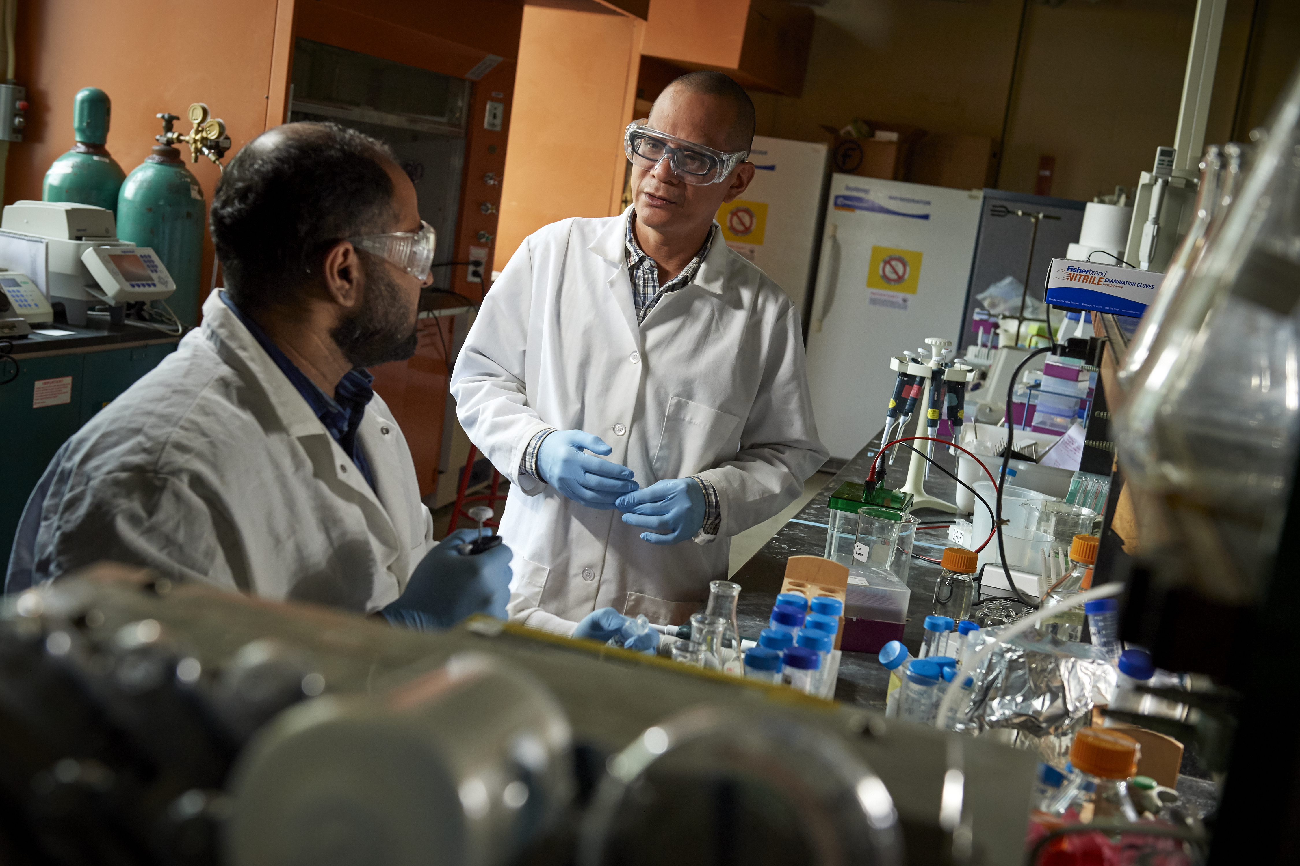 Student in the lab with Professor Edgardo Farinas